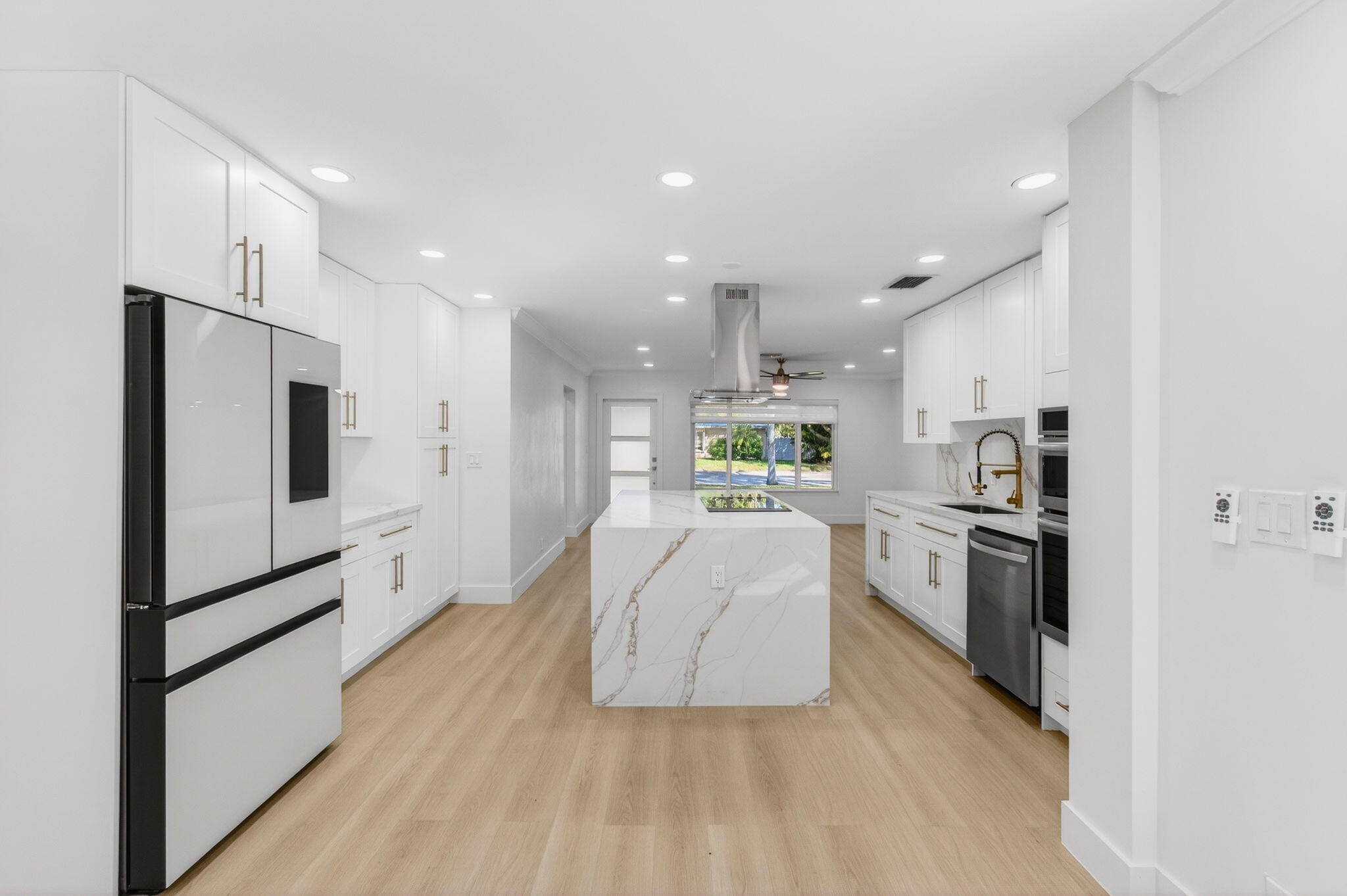 360 Southwest 2nd Street Boca Raton, FL 33432 - Photo 25 of 100 a large white kitchen with stainless steel appliances granite countertop a refrigerator a stove a sink and a oven