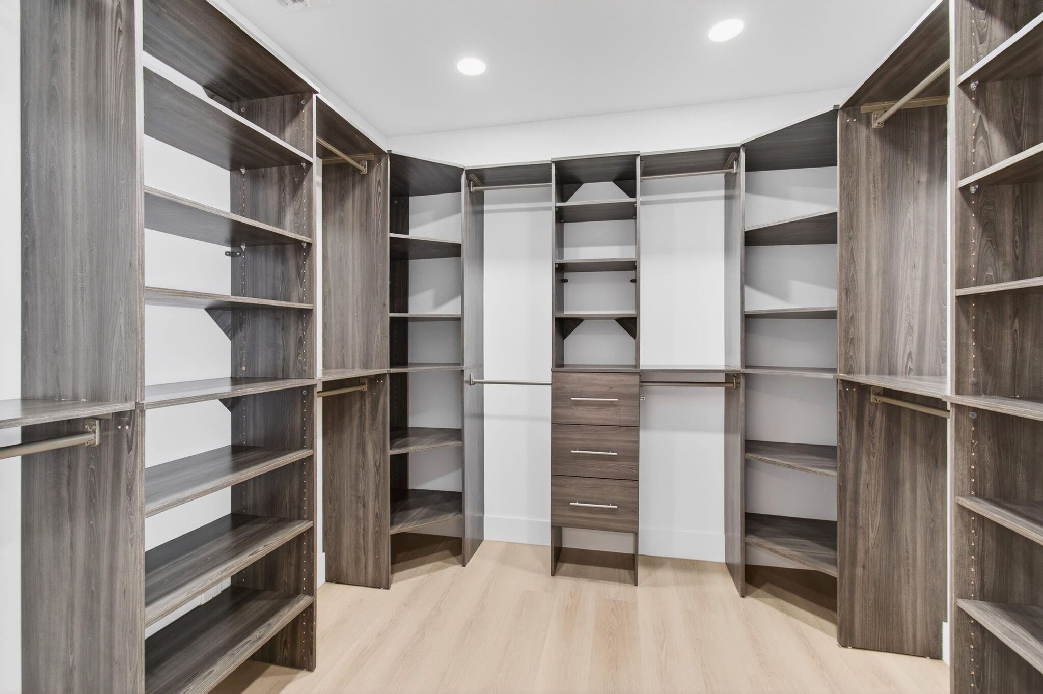 360 Southwest 2nd Street Boca Raton, FL 33432 - Photo 35 of 100 a view of walk in closet with empty racks