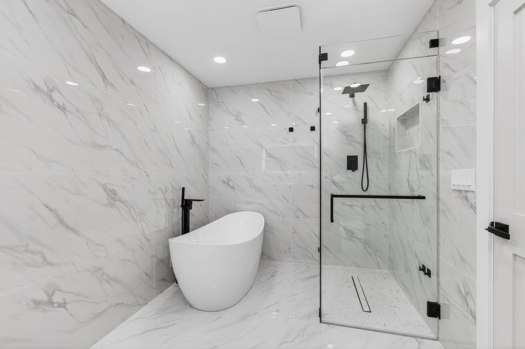 360 Southwest 2nd Street Boca Raton, FL 33432 - Photo 37 of 100 a bathroom with a shower and bathtub