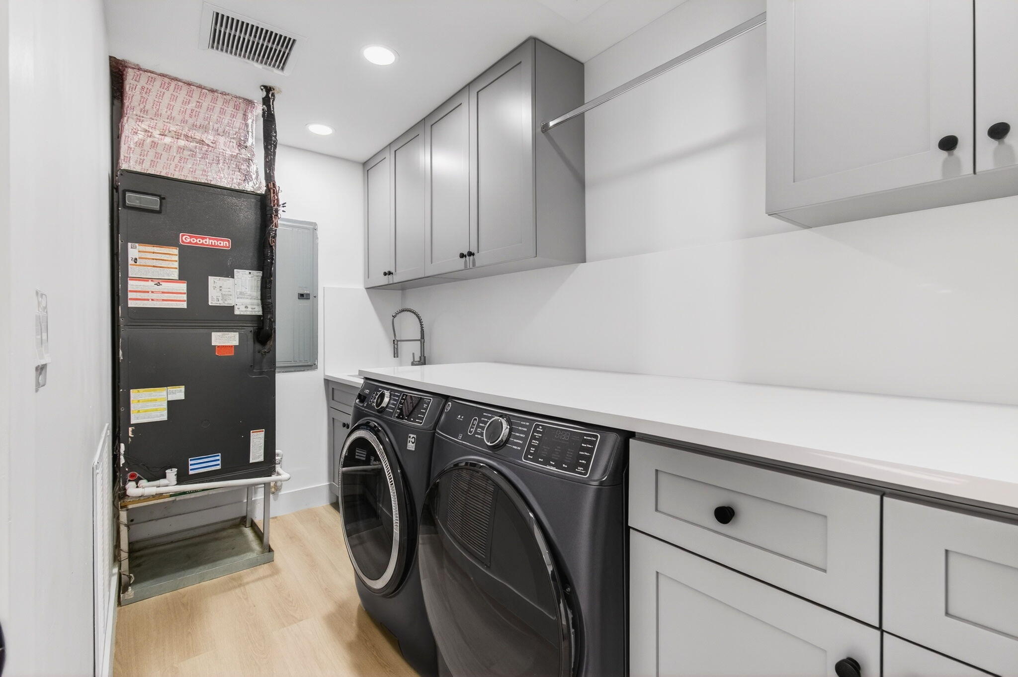 360 Southwest 2nd Street Boca Raton, FL 33432 - Photo 41 of 100 a utility room with closet dryer and washer