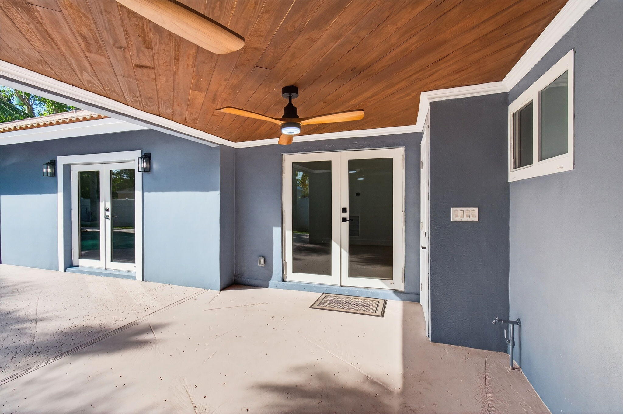 360 Southwest 2nd Street Boca Raton, FL 33432 - Photo 62 of 100 a view of a brick house with a large window