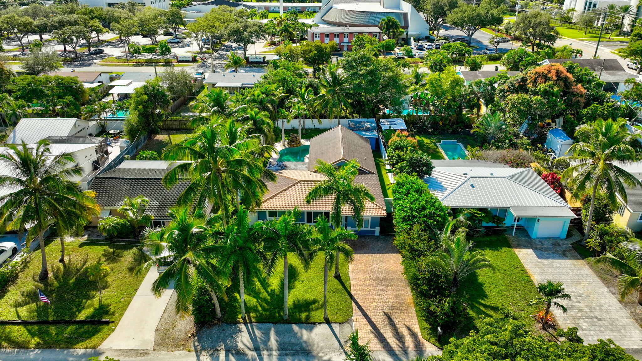 360 Southwest 2nd Street Boca Raton, FL 33432 - Photo 94 of 100 an aerial view of residential house with outdoor space and trees all around