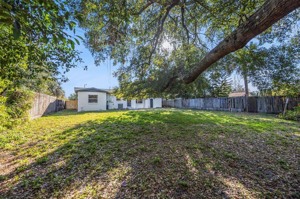 1001 Alton Avenue Orlando, FL 32804 - Photo 19 of 20 a view of a house with a yard