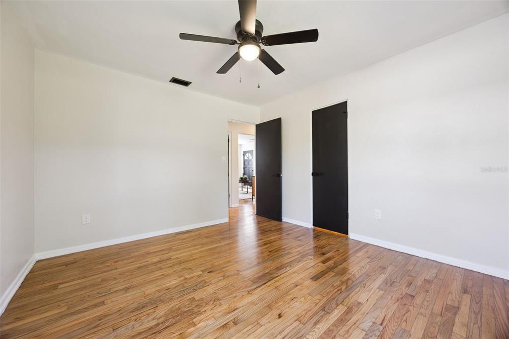 1001 Alton Avenue Orlando, FL 32804 - Photo 10 of 20 a view of an empty room with wooden floor