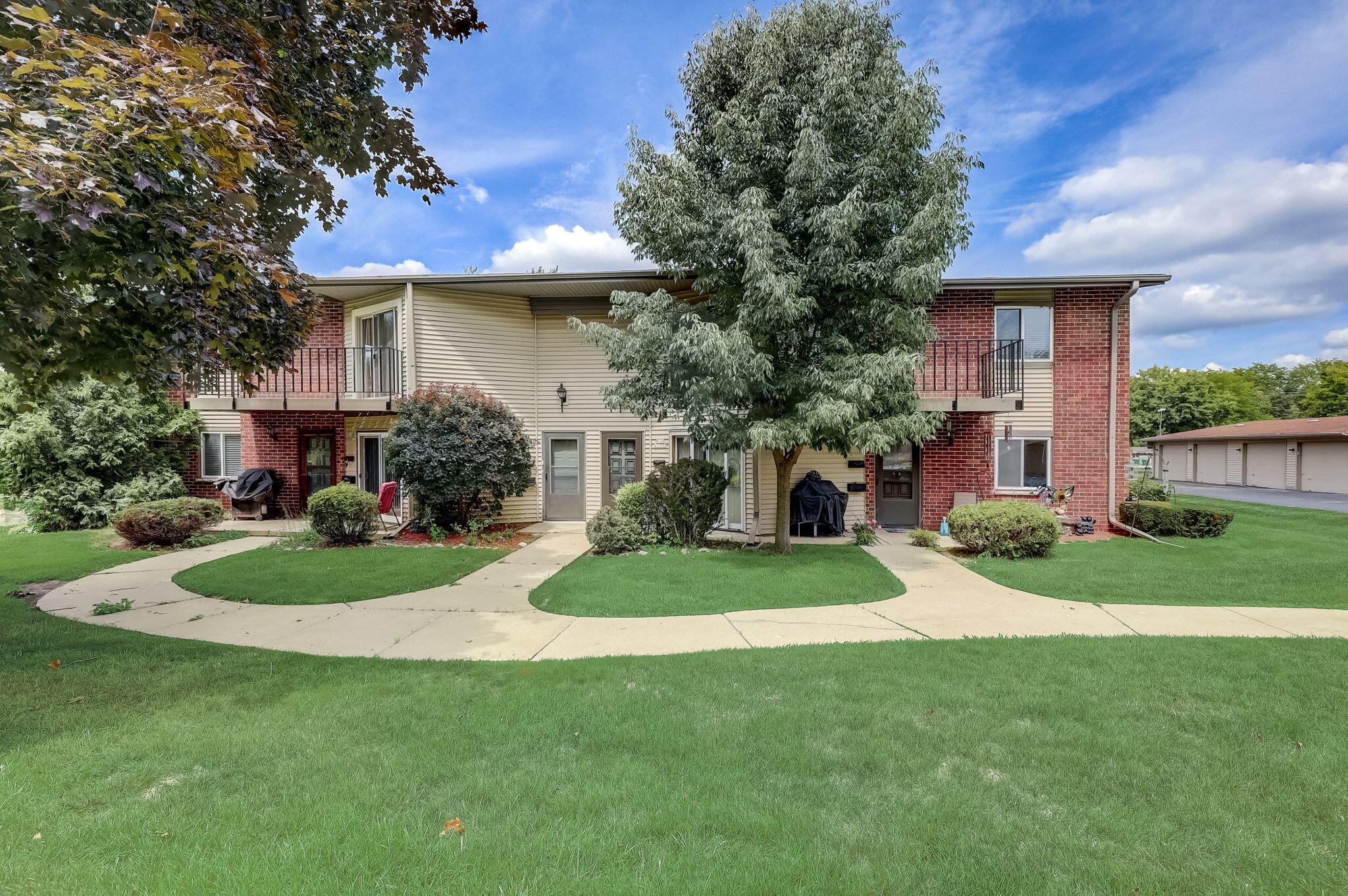 W168N11539 El Camino Drive Germantown, WI 53022 - Photo 1 of 1 Front of Condo