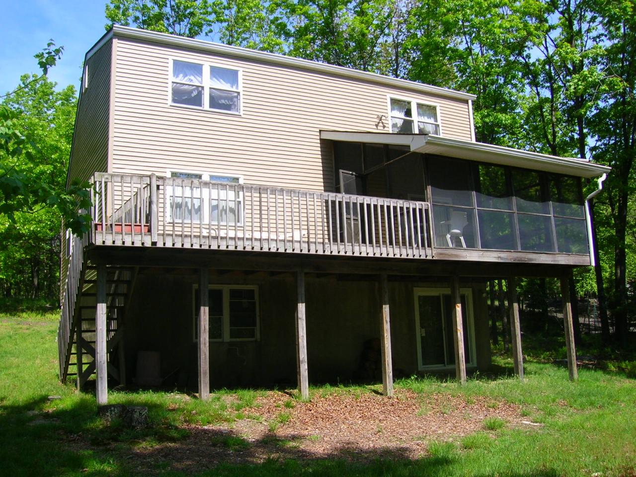 143 Pine Ridge Drive West Bushkill, PA 18324 - Photo 13 of 13 BACK OF HOME (SCREENED PORCH/DECK)