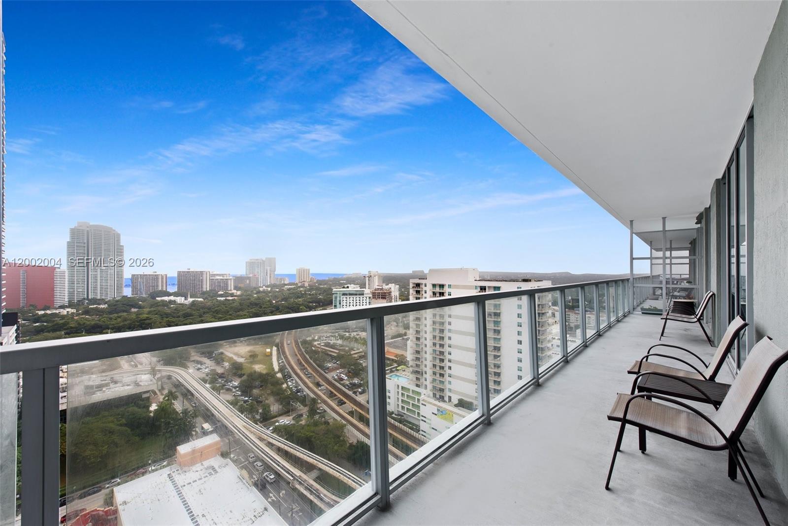 79 Southwest 12th Street, Unit 2503S Miami, FL 33130 - Photo 20 of 27 a view of a city street from a balcony