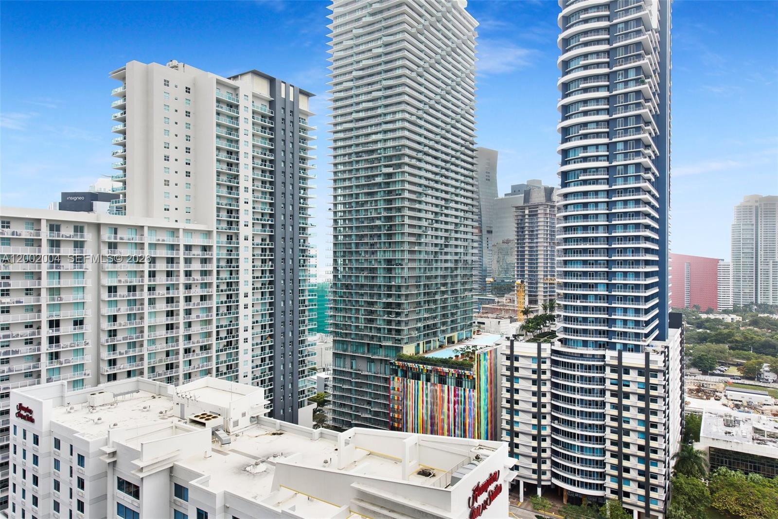 79 Southwest 12th Street, Unit 2503S Miami, FL 33130 - Photo 21 of 27 a barbeque area with building in front of it