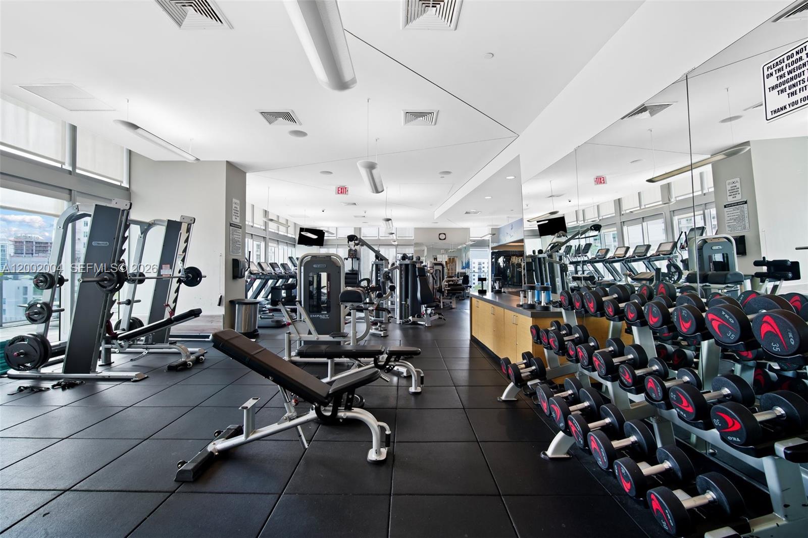 79 Southwest 12th Street, Unit 2503S Miami, FL 33130 - Photo 24 of 27 a view of a room with gym equipment