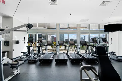 a view of a room with gym equipment