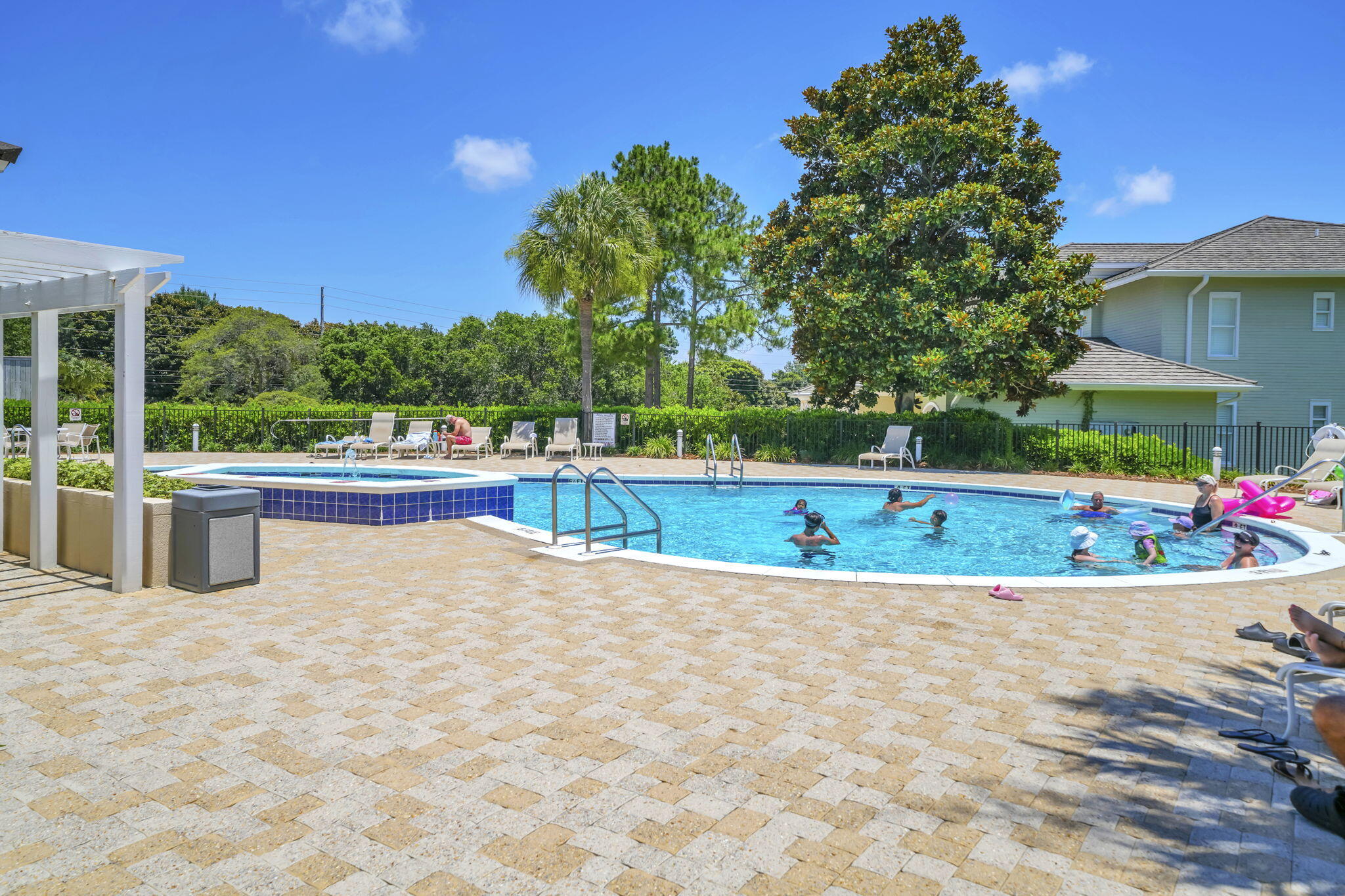 5360 Pine Ridge Lane, Unit 5360 Miramar Beach, FL 32550 - Photo 42 of 44 a view of a swimming pool with a patio