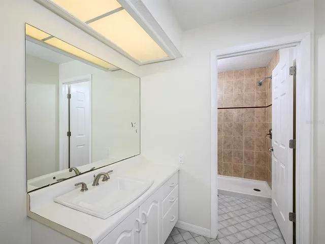 a dining room with furniture and a rug