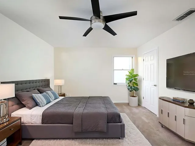 a outdoor dining space with furniture and outdoor view