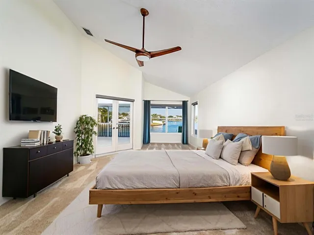 a view of a balcony with two chairs