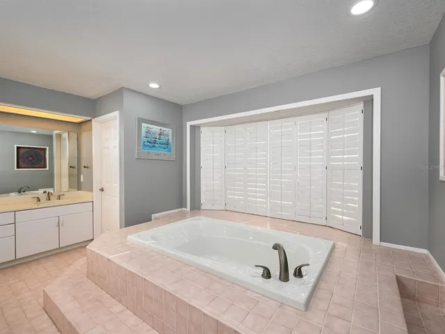 a view of a kitchen with chair and stove