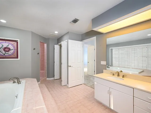 an aerial view of a house with lake view