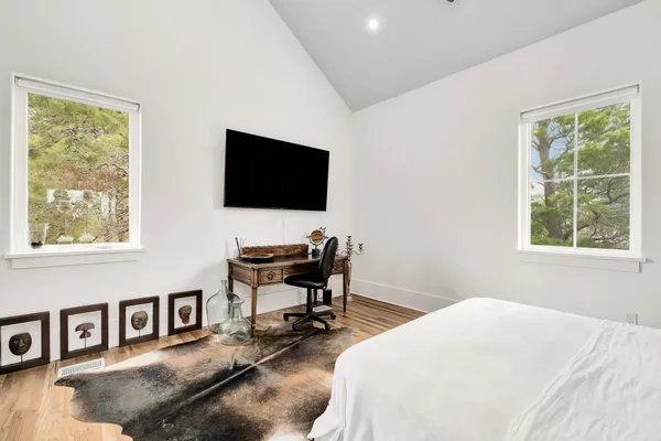 a front view of a house with sitting space