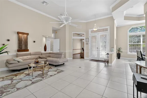a spacious bathroom with a sink a mirror and a shower