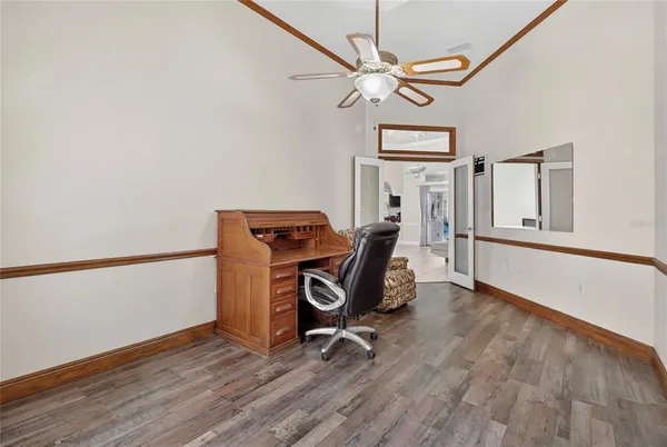 a view of a dining room with furniture and window