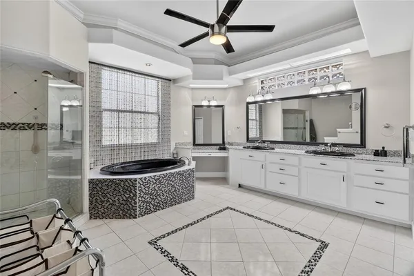 a view of a livingroom with furniture and a window