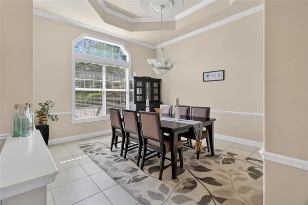 a kitchen with stainless steel appliances granite countertop a refrigerator sink and cabinets