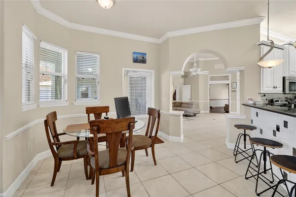 a kitchen with stainless steel appliances granite countertop a sink and cabinets