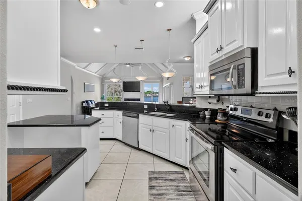 a view of a livingroom with furniture