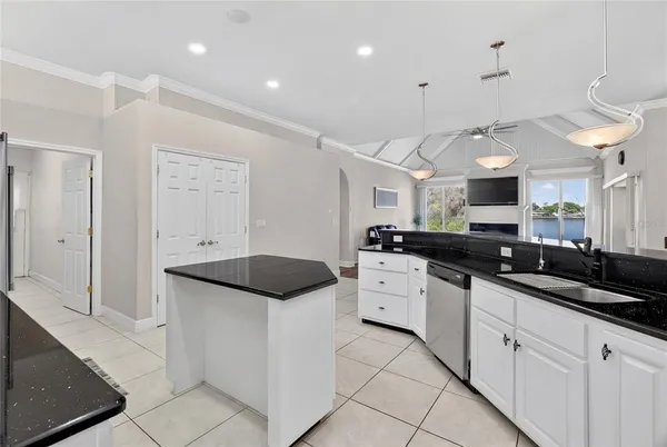 a view of a swimming pool with a lounge chairs