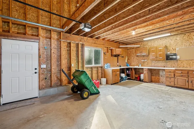 a view of a room with wooden ceiling