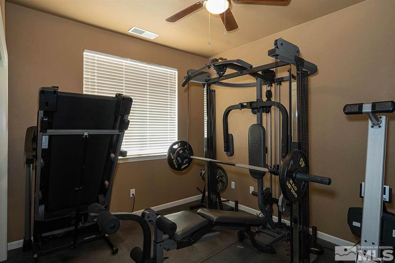 490 Oldenburg Drive Reno, NV 89521 - Photo 17 of 25 a view of a room with gym equipment
