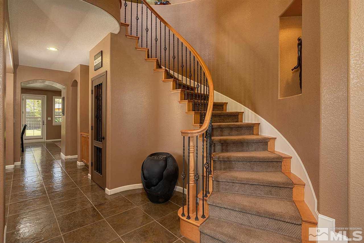 490 Oldenburg Drive Reno, NV 89521 - Photo 7 of 25 a view of entryway and hall with wooden floor