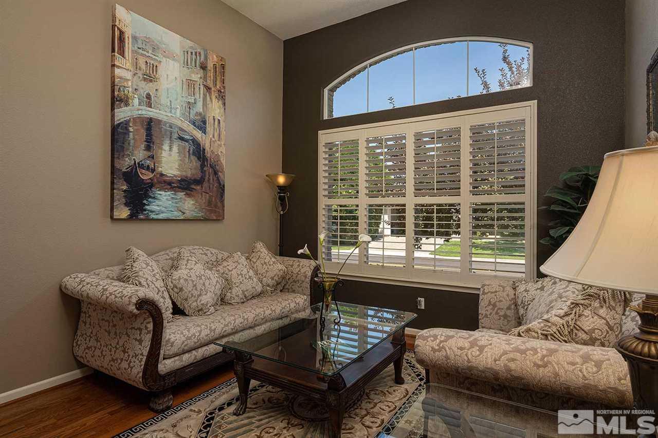 490 Oldenburg Drive Reno, NV 89521 - Photo 10 of 25 a living room with furniture and a large window