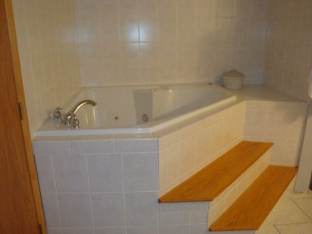 12137 Sullivan Road Emmett, MI 48022 - Photo 19 of 26 This is a view of the tub in the basement bathroom.