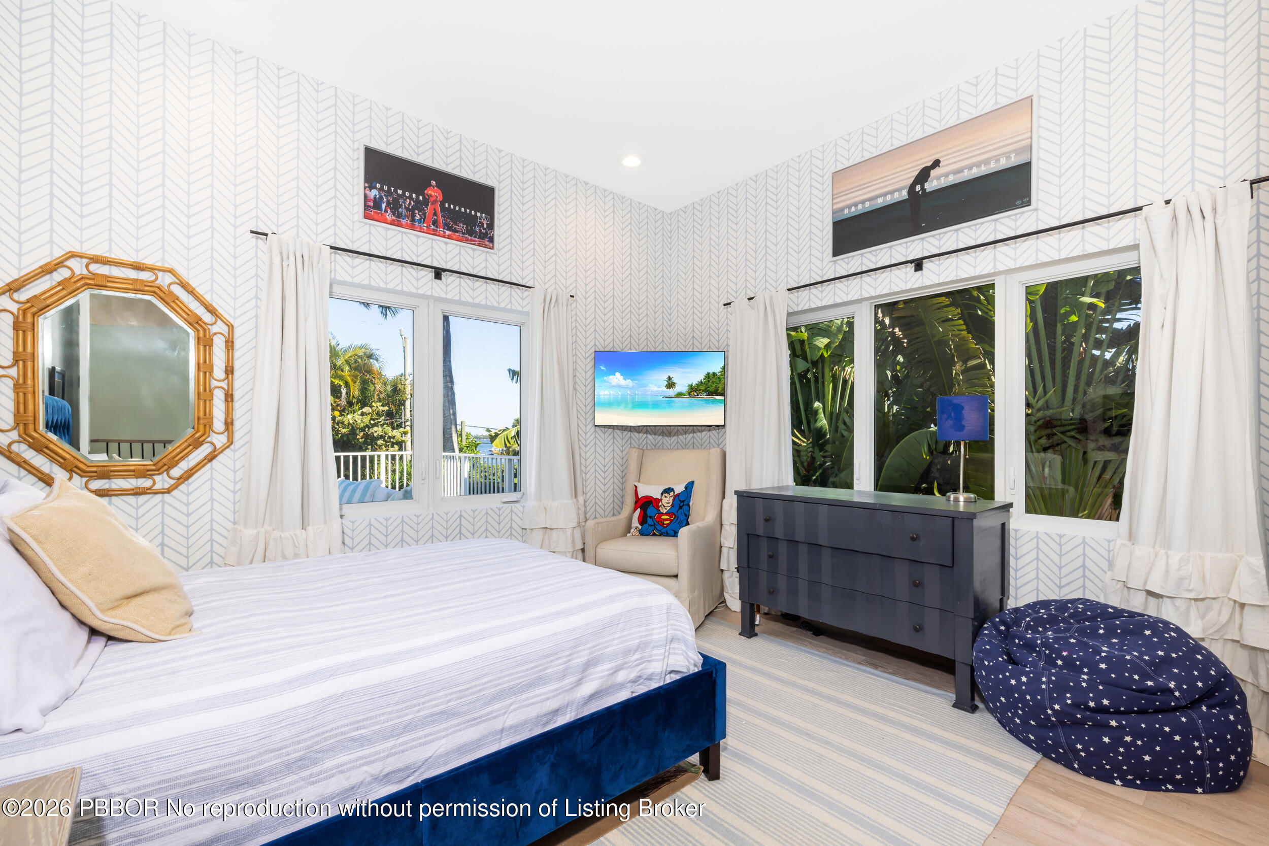 121 Seville Road West Palm Beach, FL 33405 - Photo 45 of 67 a bedroom with a bed and a large window