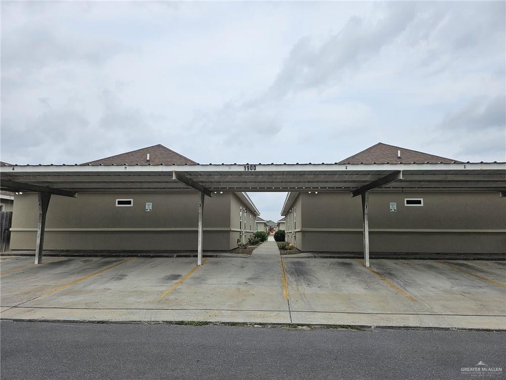 1900 Jackson Street, Unit 2 Weslaco, TX 78599 - Photo 2 of 13 a view of house with car parked