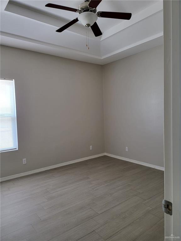 1900 Jackson Street, Unit 2 Weslaco, TX 78599 - Photo 3 of 13 an empty room with a window