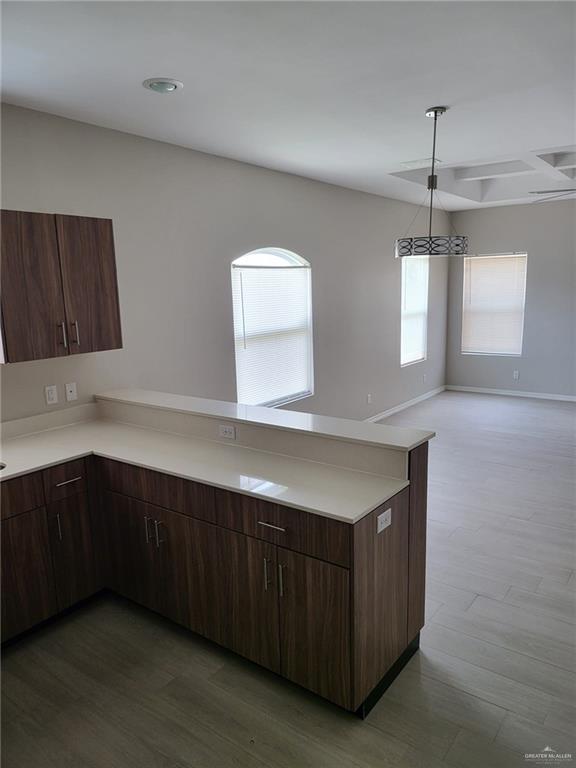 1900 Jackson Street, Unit 2 Weslaco, TX 78599 - Photo 12 of 13 a kitchen with cabinets and window