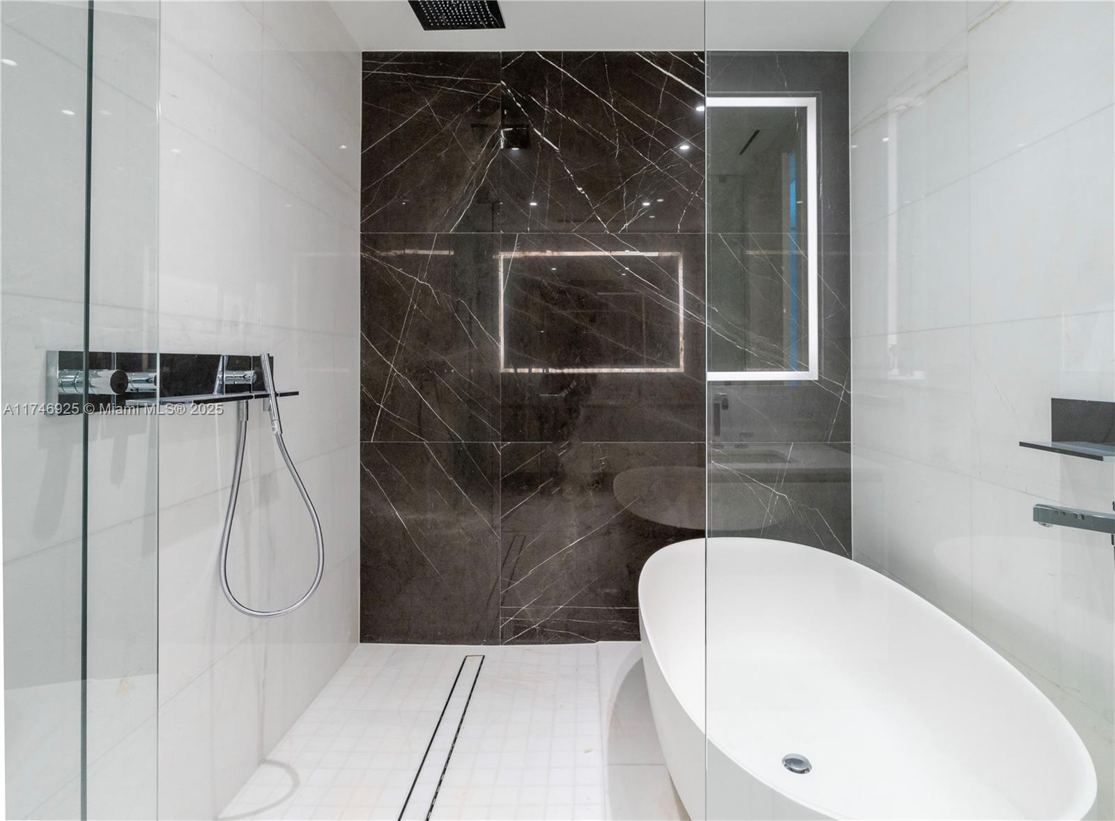 300 Biscayne Boulevard, Unit 4305 Miami, FL 33132 - Photo 11 of 32 a bathroom with a shower
