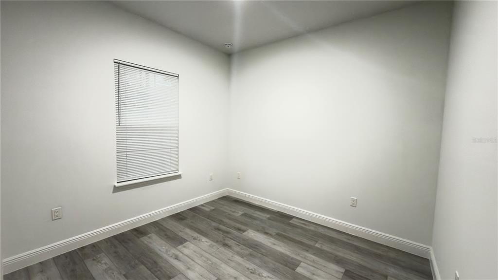 13047 Southwest 79th Circle Ocala, FL 34473 - Photo 12 of 29 an empty room with a window
