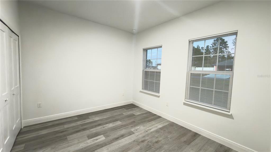 13047 Southwest 79th Circle Ocala, FL 34473 - Photo 18 of 29 a view of an empty room with a window