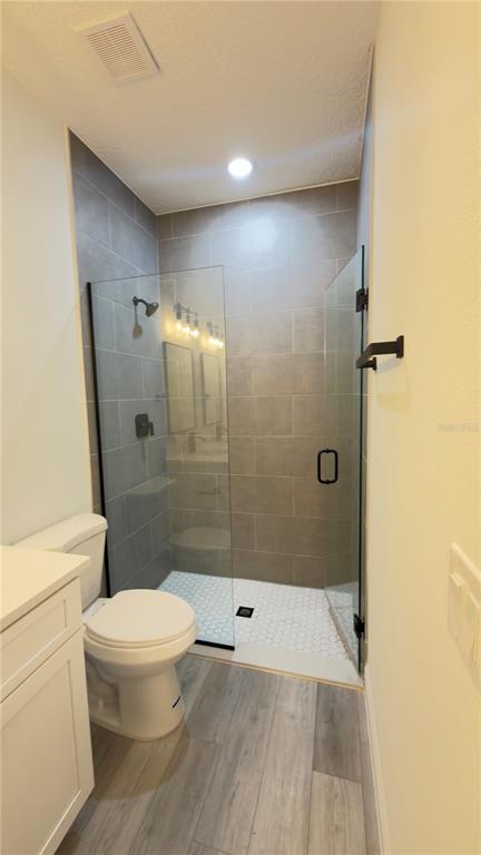13047 Southwest 79th Circle Ocala, FL 34473 - Photo 22 of 29 a bathroom with a shower and a toilet
