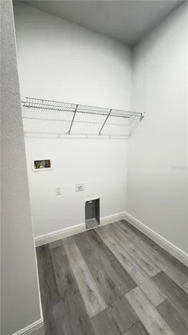 a view of a room with racks on the wall