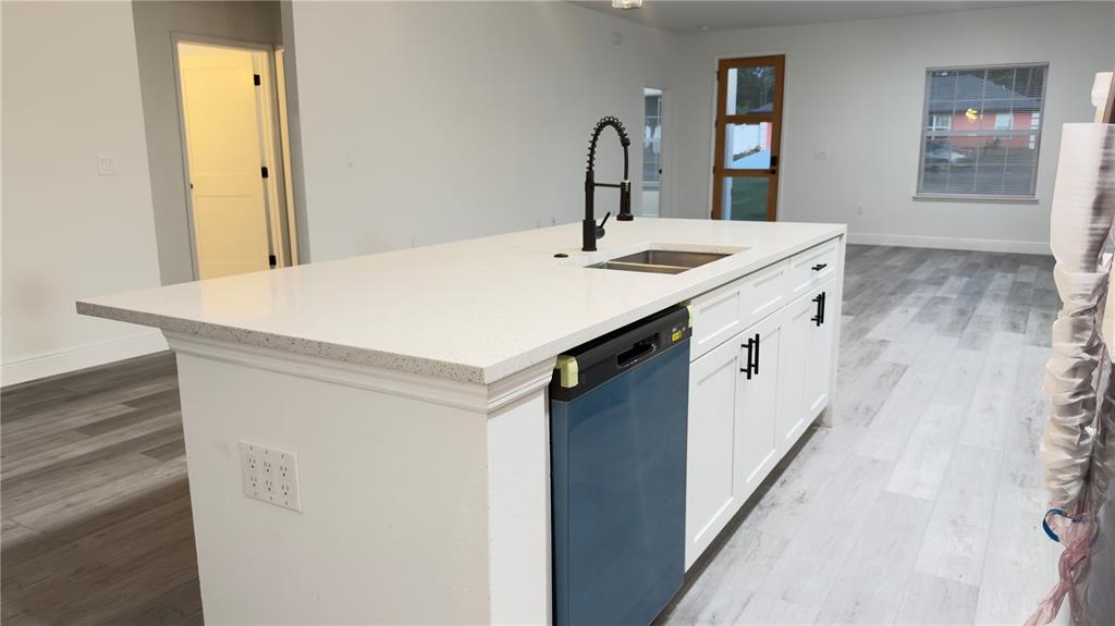 13047 Southwest 79th Circle Ocala, FL 34473 - Photo 8 of 29 a room with sink and mirror