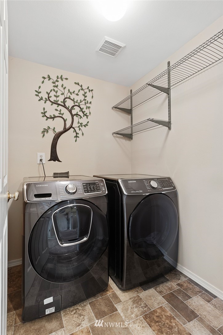 3711 Northeast 6th Street Renton, WA 98056 - Photo 14 of 20 a utility room with a sink washer and dryer