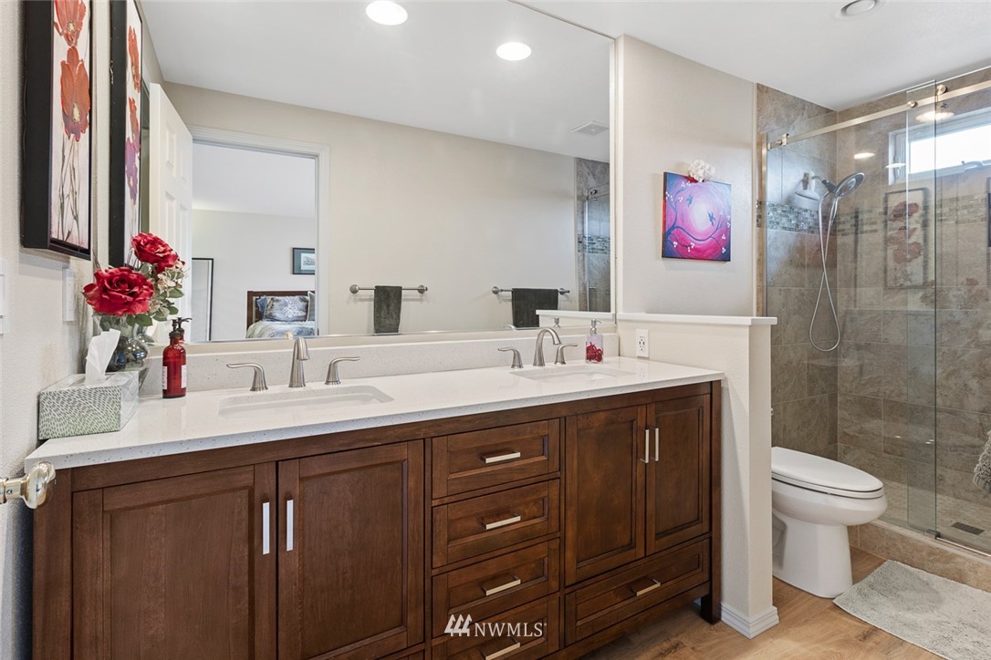 3711 Northeast 6th Street Renton, WA 98056 - Photo 17 of 20 a bathroom with a sink and a mirror