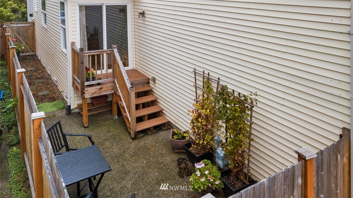 3711 Northeast 6th Street Renton, WA 98056 - Photo 20 of 20 a backyard of a house with lots of green space