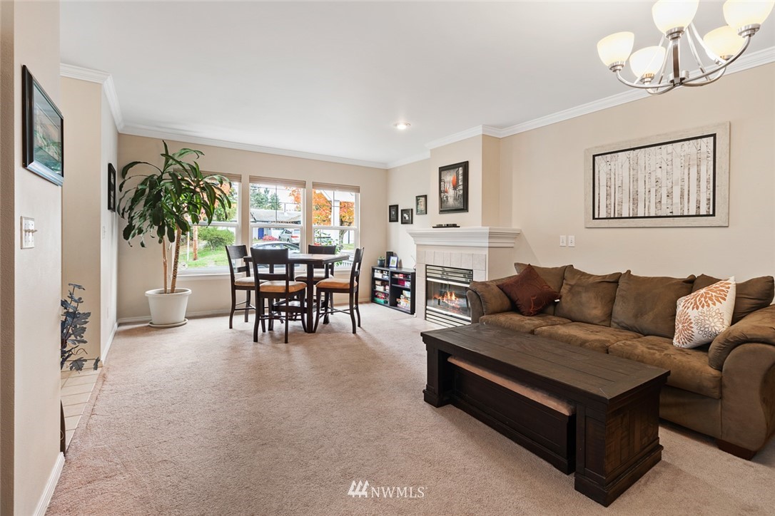 3711 Northeast 6th Street Renton, WA 98056 - Photo 5 of 20 a living room with furniture and a large window