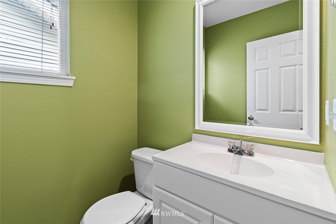 3711 Northeast 6th Street Renton, WA 98056 - Photo 7 of 20 a bathroom with a sink and a toilet