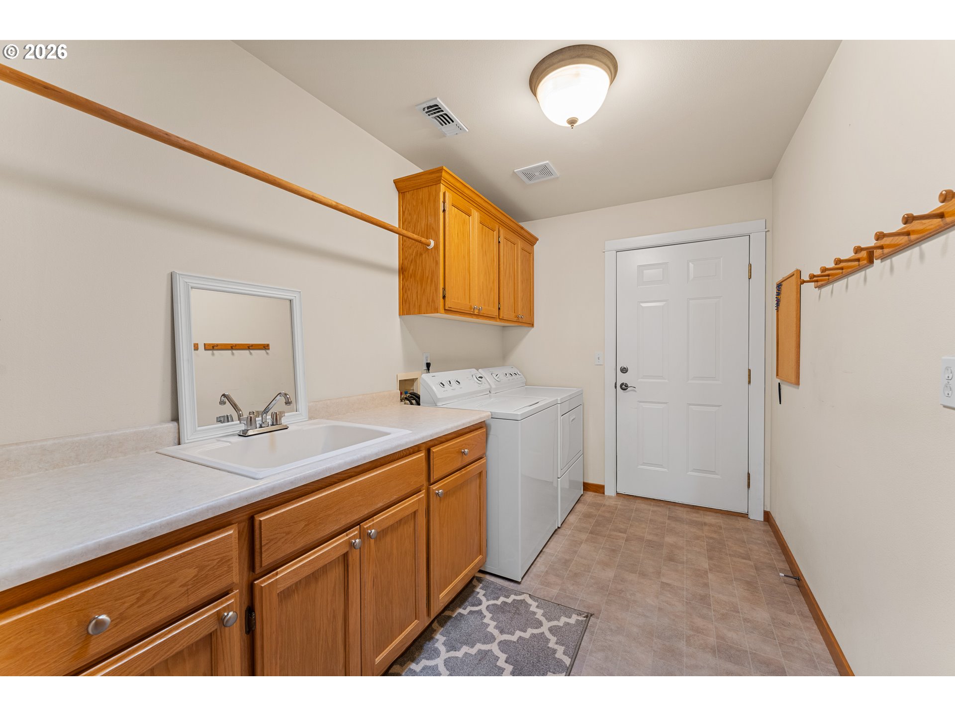 2188 Marie Drive Grants Pass, OR 97526 - Photo 22 of 27 a bathroom with a sink and a mirror