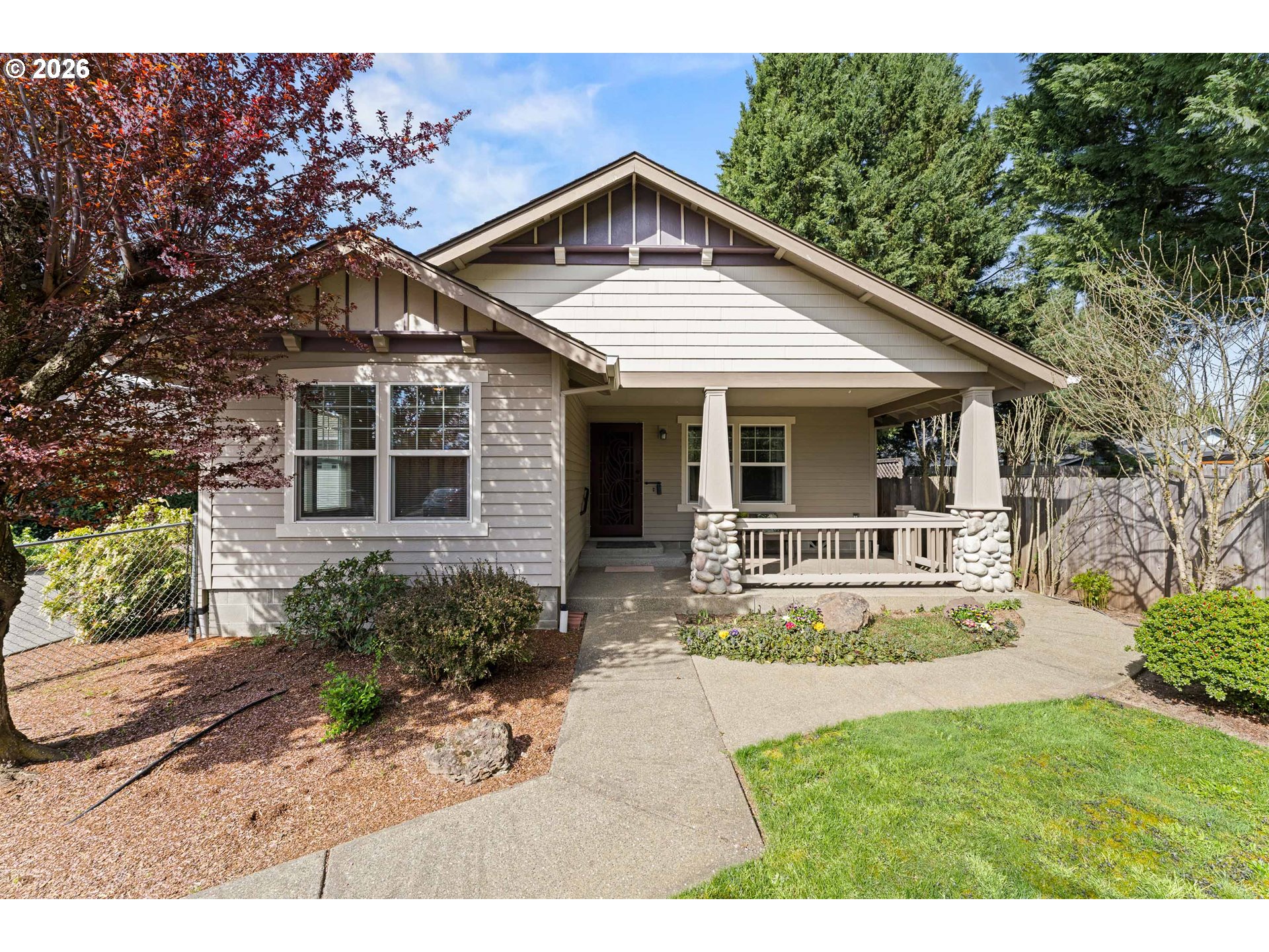 2188 Marie Drive Grants Pass, OR 97526 - Photo 3 of 27 a front view of a house with a yard